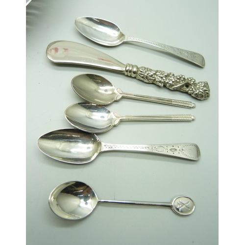 814 - Three silver spoons, 37g, together with a collection of silver plated items including a mother of pe... 