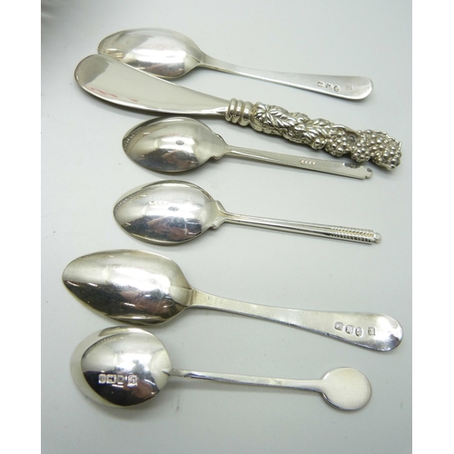 814 - Three silver spoons, 37g, together with a collection of silver plated items including a mother of pe... 