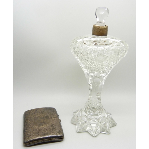 815 - A silver cigarette case, 61g, a/f and a silver rimmed scent bottle, a/f (glass chipped)