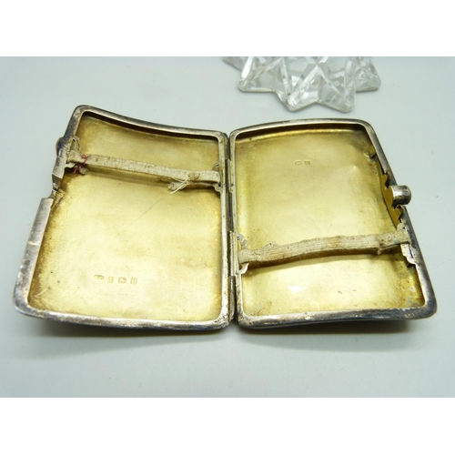 815 - A silver cigarette case, 61g, a/f and a silver rimmed scent bottle, a/f (glass chipped)