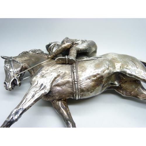 816 - A hallmarked silver model of a racehorse and jockey, resin filled, Sheffield 1997, base 26.5cm x 6.8... 