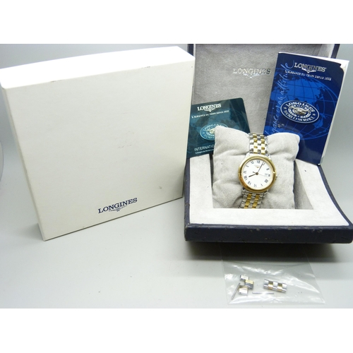 818 - A gentleman's Longines wristwatch, boxed with paperwork and spare links, 38mm including crown