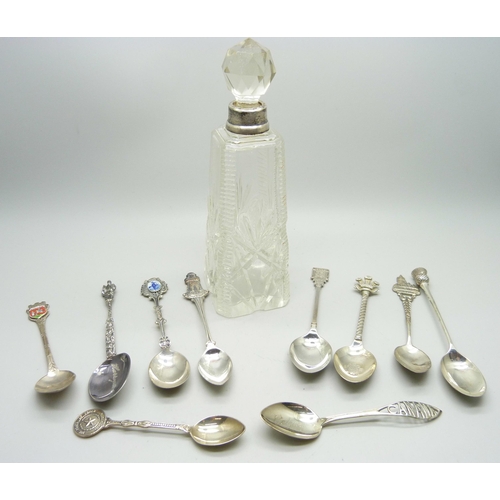 821 - A collection of silver spoons, three with British hallmarks, 34g and other continental examples in .... 