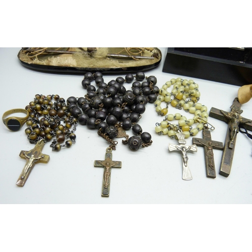 823 - A wooden box, a collection of rosary beads including one with .800 silver cross and other items