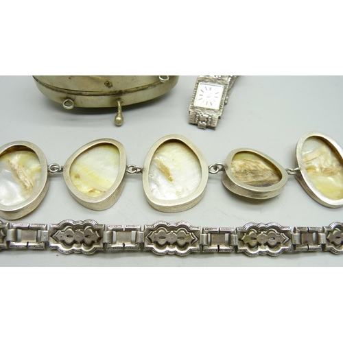 824 - A silver and mother of pearl bracelet, a silver and paste set bracelet, a lady's silver cocktail wat... 