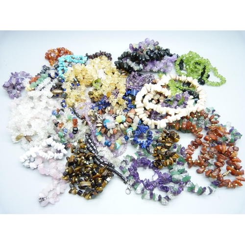 831 - Eighteen gemstone necklaces and twenty-one bracelets