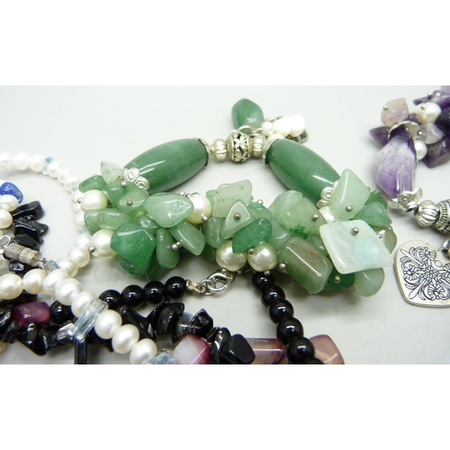 835 - Four gemstone bracelets and five necklaces