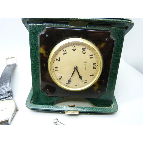 839 - An 8 day travel clock, wristwatches, lighters and a Masonic medal, inscribed 'Presented to the lodge... 