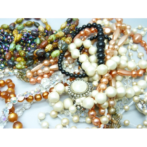 843 - Vintage bead necklaces and brooches