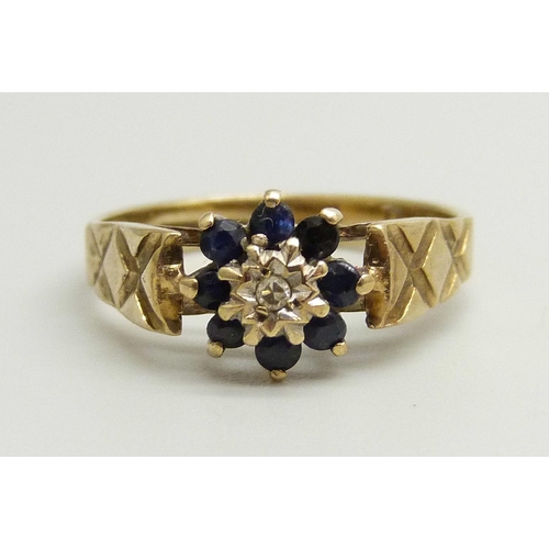 866 - A 9ct gold, blue stone and diamond cluster ring, 2.2g, K