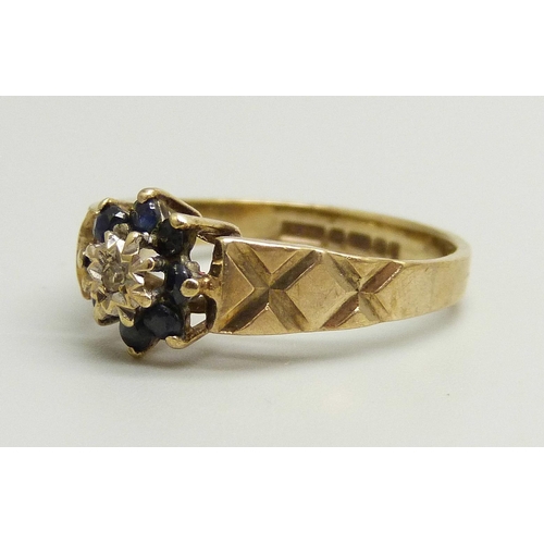 866 - A 9ct gold, blue stone and diamond cluster ring, 2.2g, K