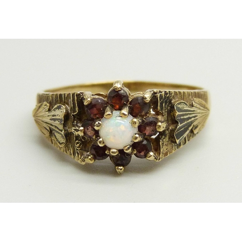 873 - A 9ct gold, garnet and opal cluster ring, 3.2g, R