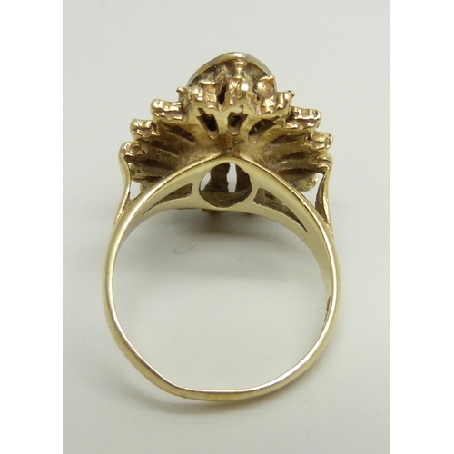 874 - A 9ct gold and diamond ring, approximately 0.35ct diamond weight, 6.4g, O