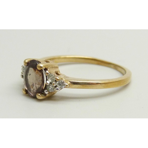 878 - A 9ct gold, colour change garnet and white spinel ring, 2g, L