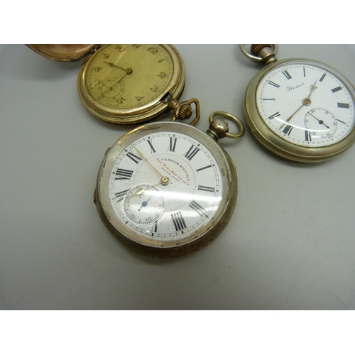 883 - A gold plated full hunter pocket watch in an engine turned case (closure a/f), a .935 silver cased J... 