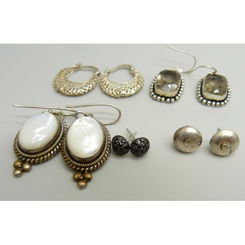 886 - A pair of Suati silver and mother of pearl drop earrings, a pair of white metal stone set earrings o... 