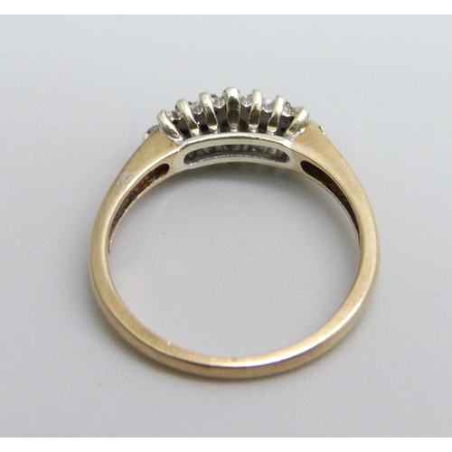 899 - A 9ct gold and diamond ring, lacking one small diamond, 2.3g, L/M