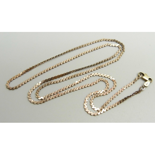 902 - A yellow metal necklace, the chain rose gold with a yellow gold replacement clasp marked 14k, 64.5cm... 