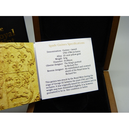 910 - The Royal Mint, a George III gold Guinea 1773, boxed with certificate