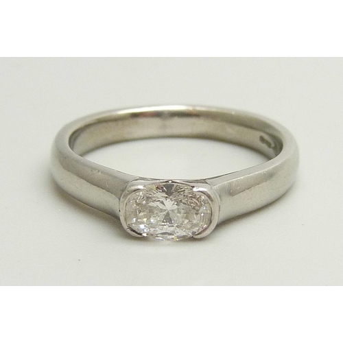 929 - A platinum and diamond solitaire ring, approximately 0.5ct diamond weight, 6.7g, M