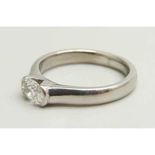 929 - A platinum and diamond solitaire ring, approximately 0.5ct diamond weight, 6.7g, M