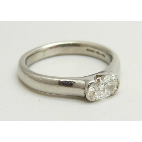 929 - A platinum and diamond solitaire ring, approximately 0.5ct diamond weight, 6.7g, M