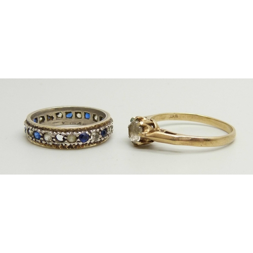 948 - A 9ct gold ring set with a white spinel, O, and a 9ct gold and silver eternity ring (a/f lacking sto... 