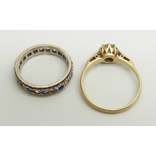 948 - A 9ct gold ring set with a white spinel, O, and a 9ct gold and silver eternity ring (a/f lacking sto... 