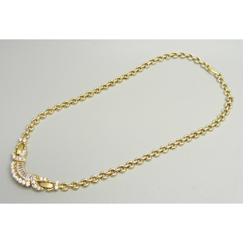 951 - A 14ct gold and white stone set necklace, (small split in one hollow link), 25.8g