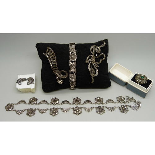 959 - A collection of silver and marcasite jewellery; a necklace (missing one stone), a .800 ring, two bro... 