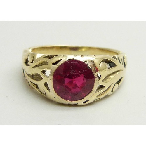 962 - A 14k gold and ruby solitaire ring, a/f, stone scratched, 4.3g, O/P