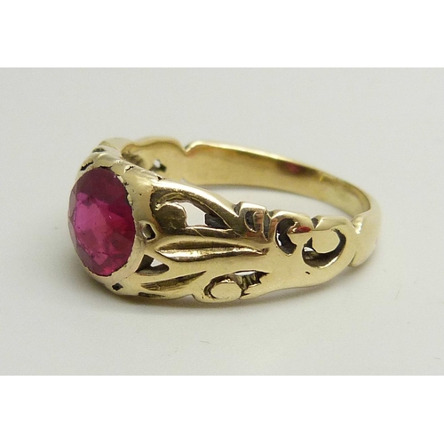 962 - A 14k gold and ruby solitaire ring, a/f, stone scratched, 4.3g, O/P