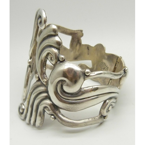 963 - A Mexican Taxco silver bangle, 54g