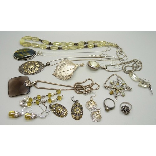 964 - A collection of silver jewellery including two filigree pendants, a citrine bead necklace and citrin... 