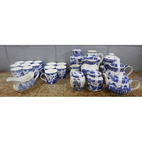 979 - Thirteen Leonardo Collection blue and white mugs, other blue and white vases, jugs, teapot, etc., Ri... 