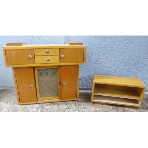 983 - A child's pram and a collection of dolls house furniture **PLEASE NOTE THIS LOT IS NOT ELIGIBLE FOR ... 