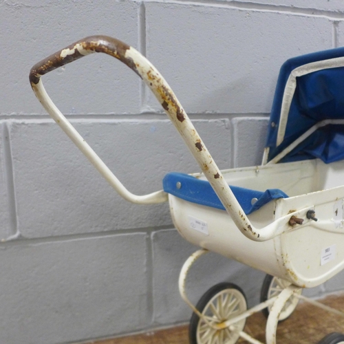 983 - A child's pram and a collection of dolls house furniture **PLEASE NOTE THIS LOT IS NOT ELIGIBLE FOR ... 