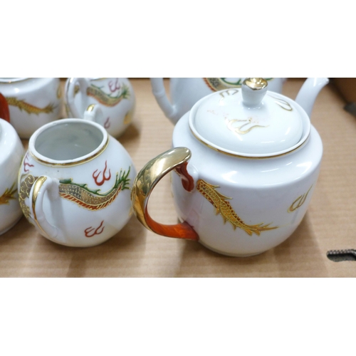 985 - A Japanese lithophane Geisha girl tea and coffee set **PLEASE NOTE THIS LOT IS NOT ELIGIBLE FOR IN-H... 