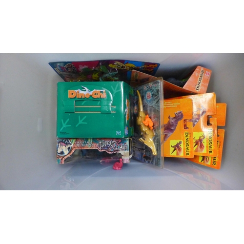 989 - A box of PC gaming magazines and two boxes of dinosaur figures **PLEASE NOTE THIS LOT IS NOT ELIGIBL... 