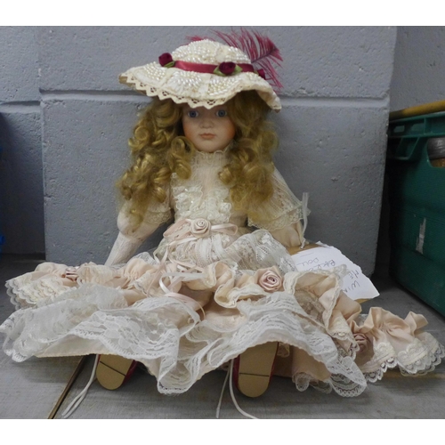 991 - A bisque head doll with wind up musical mechanism