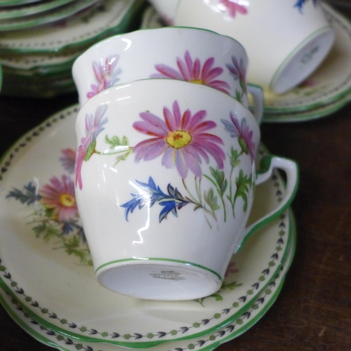 998 - An Aynsley hand painted floral part tea set, four cups a/f and Jeff Banks Porto of Call jug and pair... 