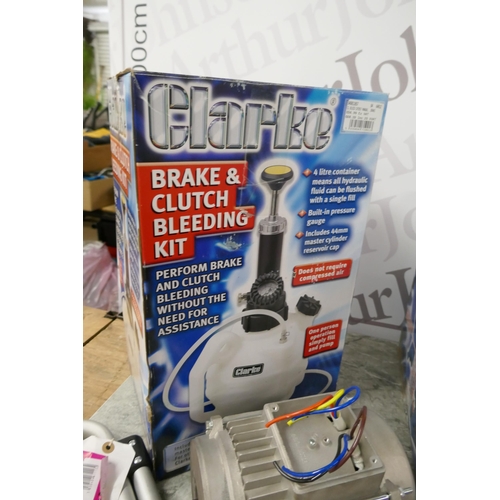 2391 - 6 Clarke returned items: a Clarke woodworker 406mm variable speed scroll saw, a Clarke brake and clu... 