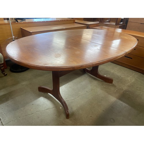 64 - A G-Plan Fresco teak oval extending dining table