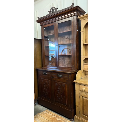 153 - A late Victorian mahogany bookcase