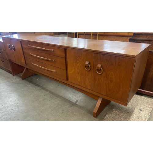 67 - A teak sideboard