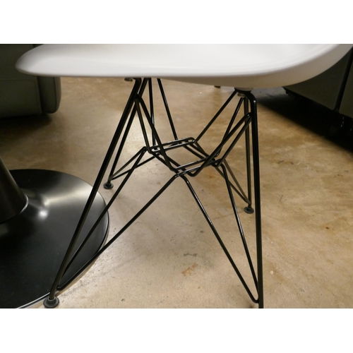 1384 - A black tulip table with two contrasting grey chairs - RRP £299