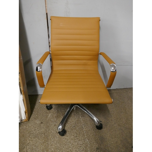 1400 - An Eames style tan faux leather office chair - RRP £149