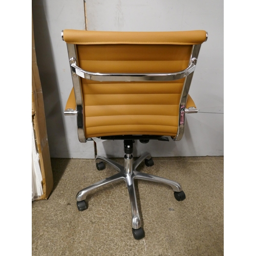 1400 - An Eames style tan faux leather office chair - RRP £149