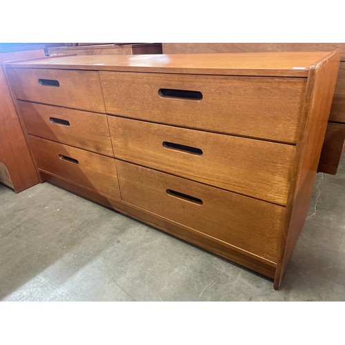 68 - A teak chest of drawers