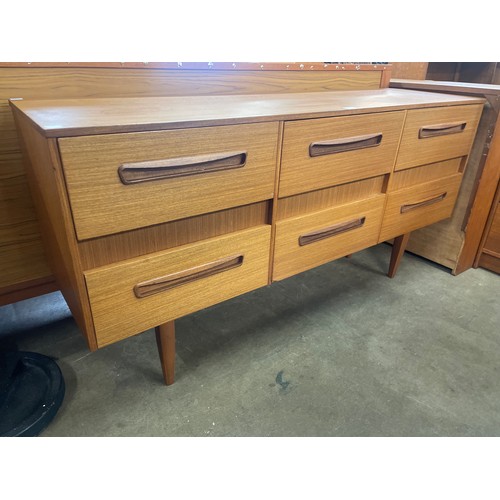 69 - A teak sideboard